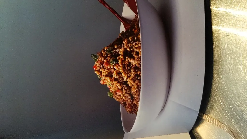 Slow cooked lamb shank and giant couscous salad