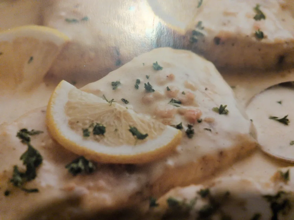Baked fish with lemon cream sauce