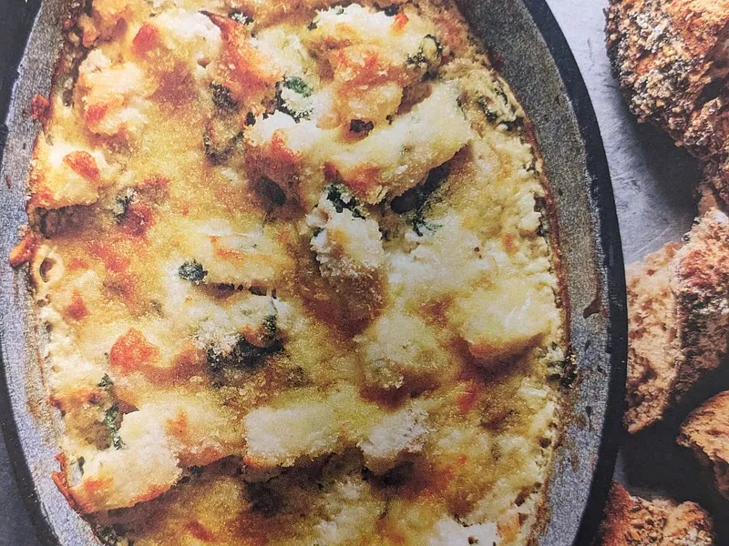 Creamy spinach & garlic fish gratin